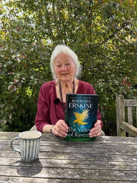 Photograph of author Barbara Erskine holding The Valley of Ravens